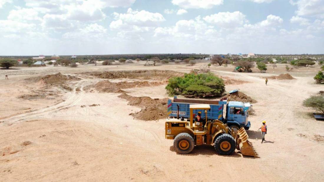 Wheel loader working on a cleared site